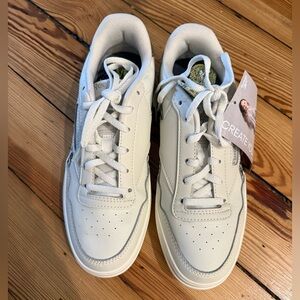 Reebok Women’s White Sneakers with Cheetah Stripe